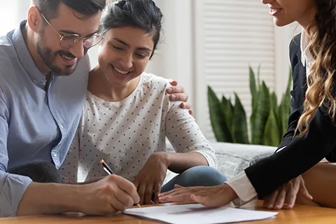 Couple having a consultation with an agent